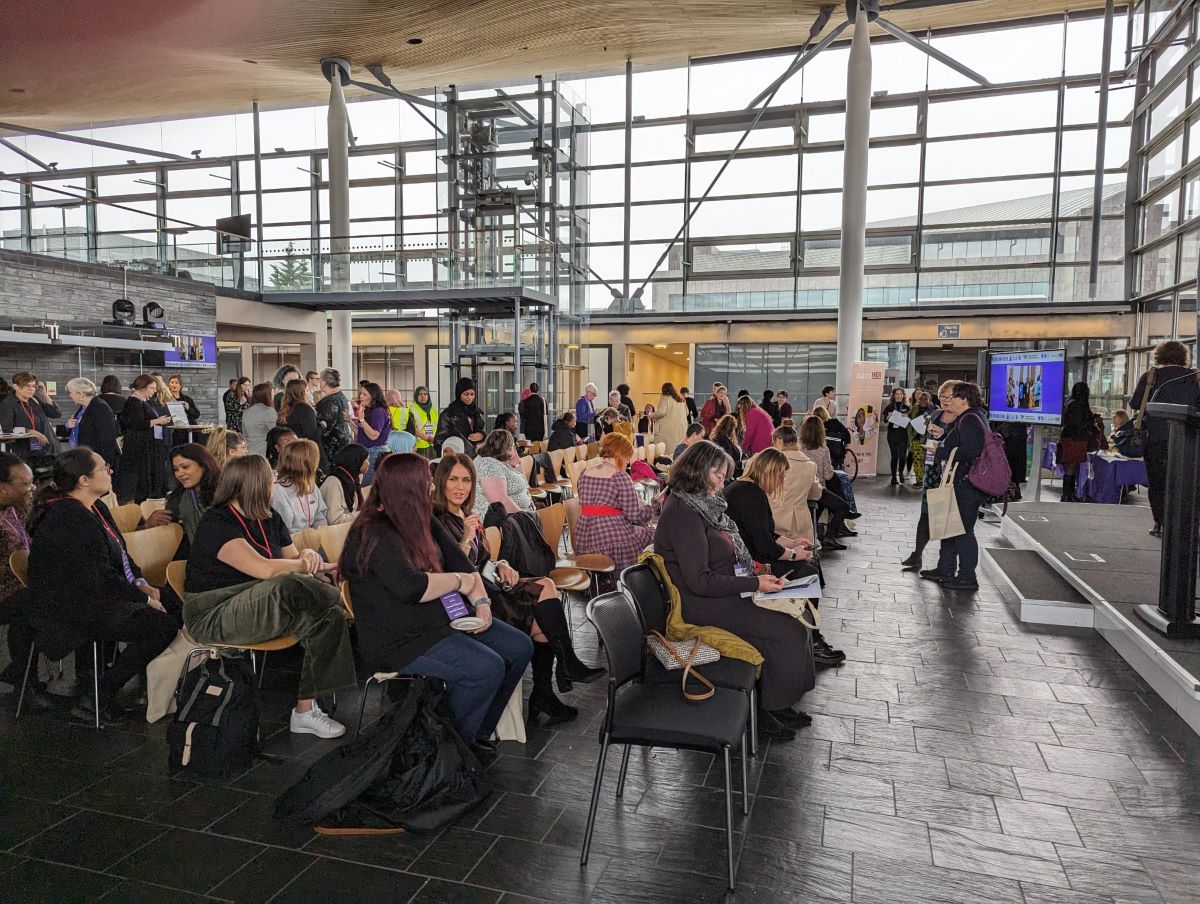 Photo of women in the hall for the We Belong Here event